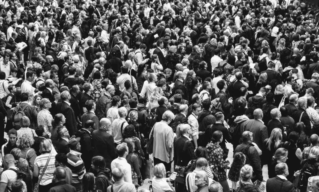 Black and white image of a large crowd of people