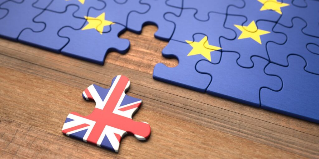 EU puzzle piece with Britain pulled out to represent Brexit